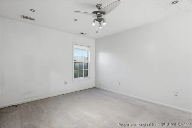 en view of an empty room with a window