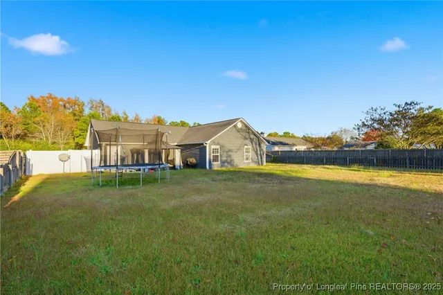 a view of swimming pool with outdoor space and seating area