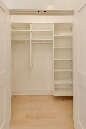 a view of an empty walk in closet