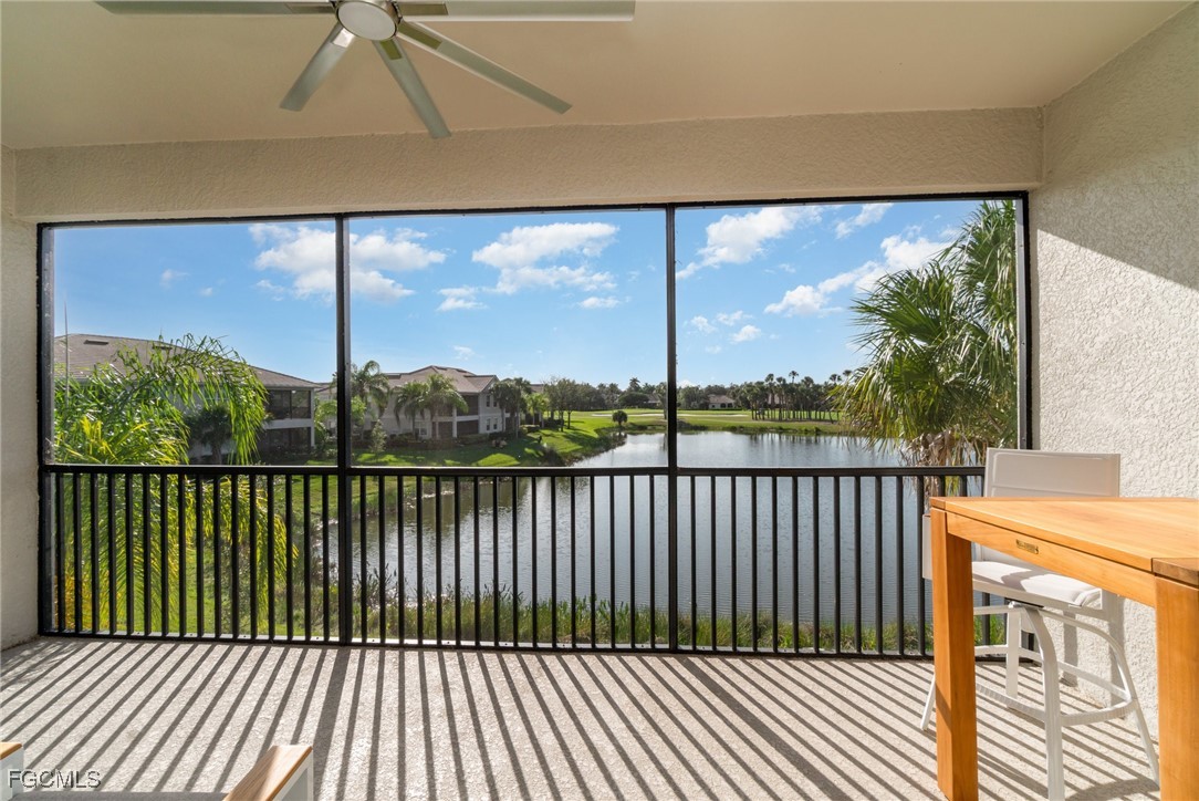 3771 Pebblebrook Ridge Court, Unit 201 Fort Myers, FL 33905 - Photo 23 of 45 a view of a balcony with a floor to ceiling window next to a yard