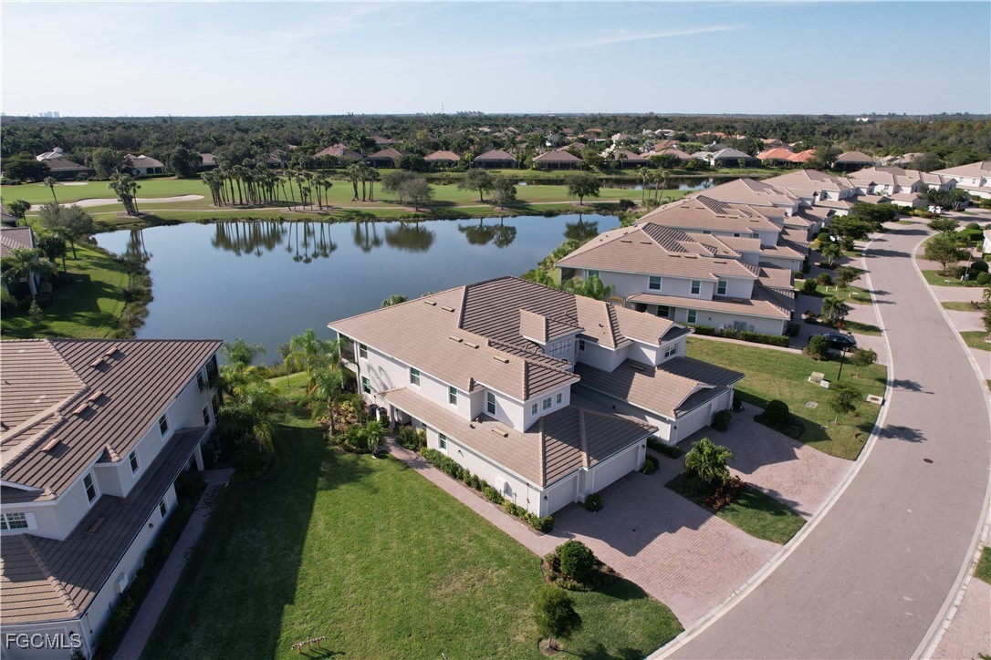 3771 Pebblebrook Ridge Court, Unit 201 Fort Myers, FL 33905 - Photo 39 of 45 an aerial view of a house with a lake view