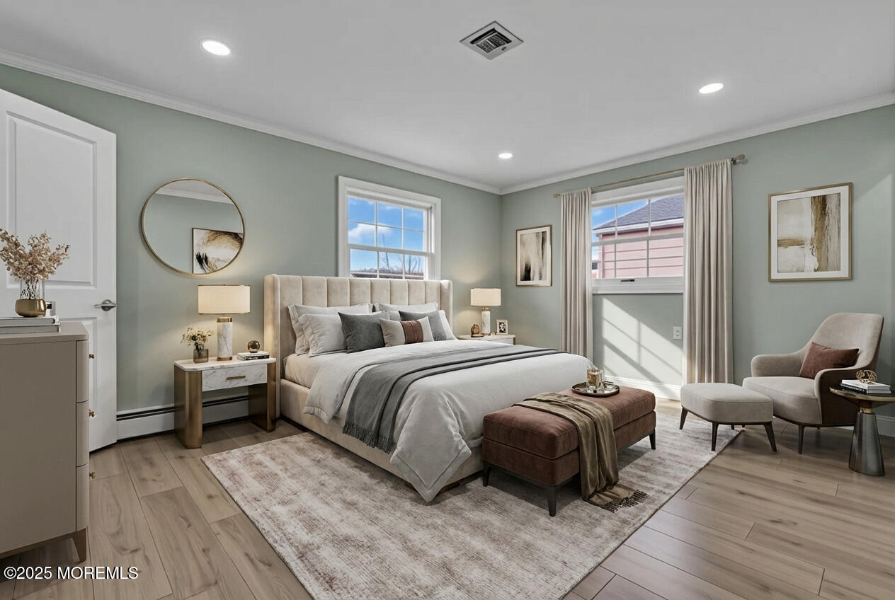 10 Aztec Court Toms River, NJ 08757 - Photo 13 of 57 a spacious bedroom with a bed a table and chair