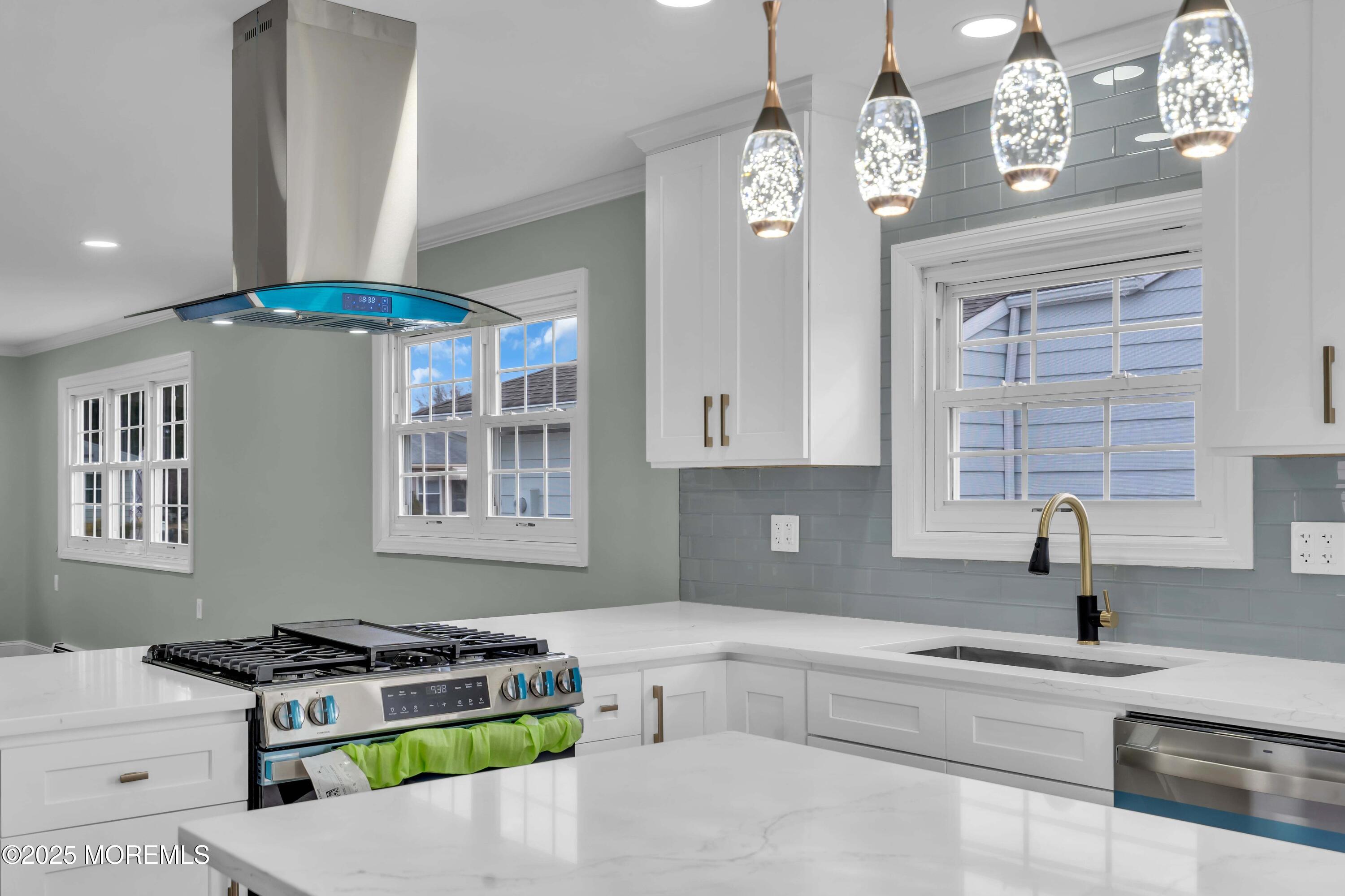 10 Aztec Court Toms River, NJ 08757 - Photo 37 of 57 a kitchen with a stove a sink and a refrigerator