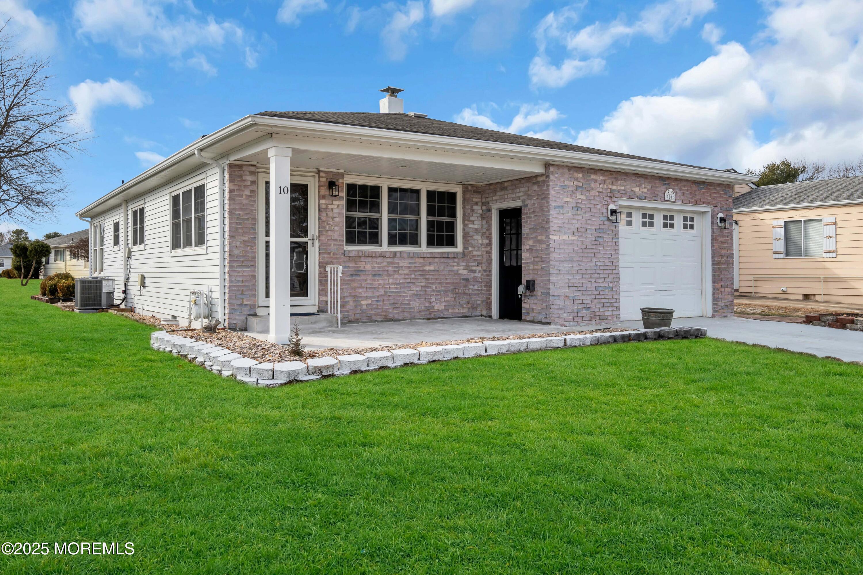 10 Aztec Court Toms River, NJ 08757 - Photo 4 of 57 a front view of house with yard
