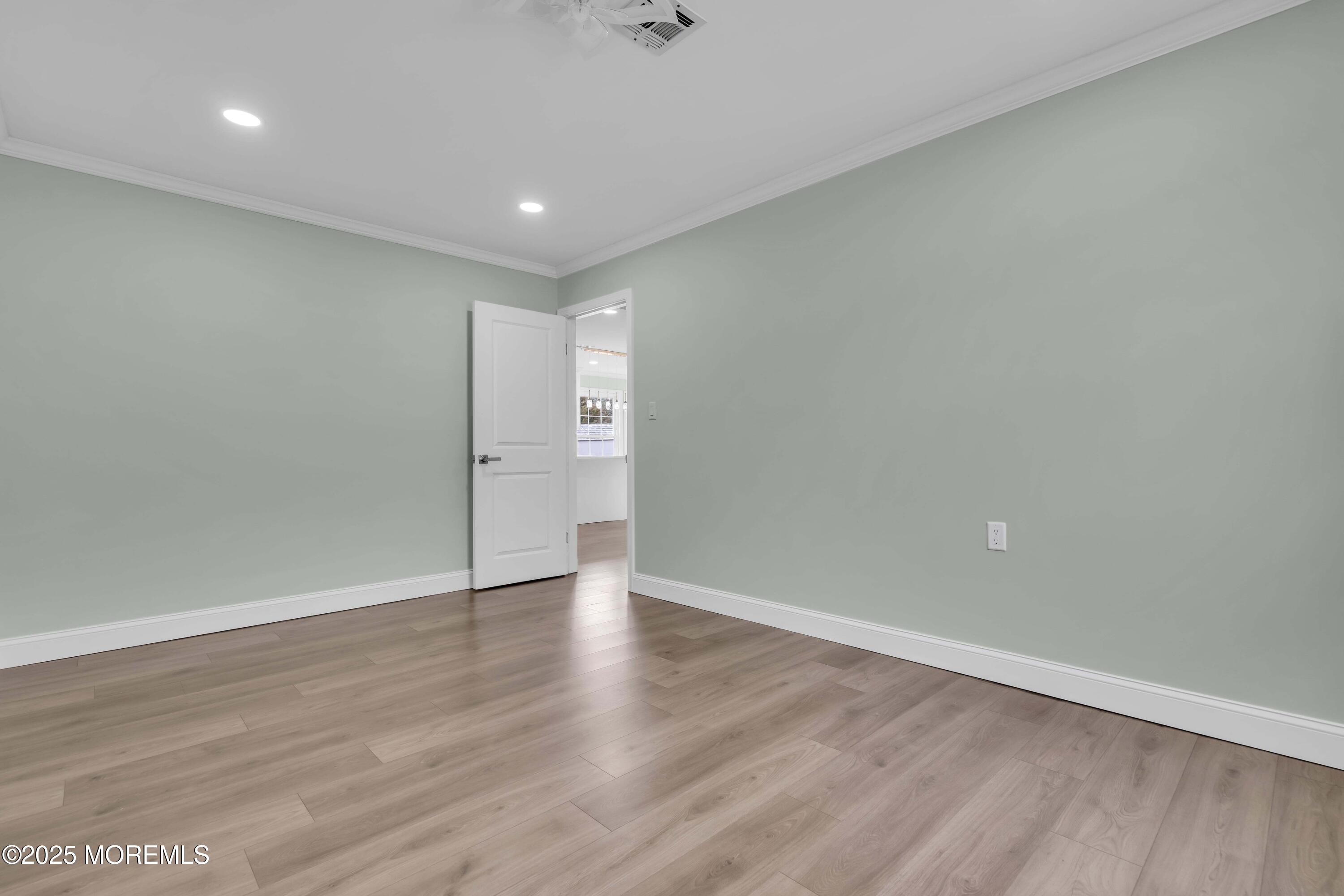 10 Aztec Court Toms River, NJ 08757 - Photo 45 of 57 a view of a room with wooden floor