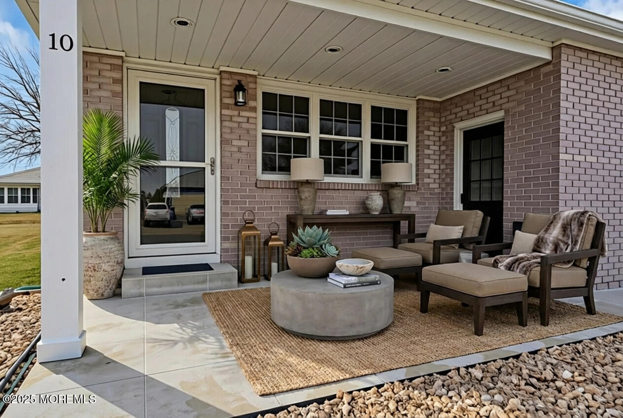 10 Aztec Court Toms River, NJ 08757 - Photo 7 of 57 a living room with furniture and windows