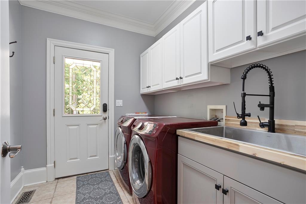 4185 Pool Road Winston, GA 30187 - Photo 18 of 51 a utility room with sink dryer and washer