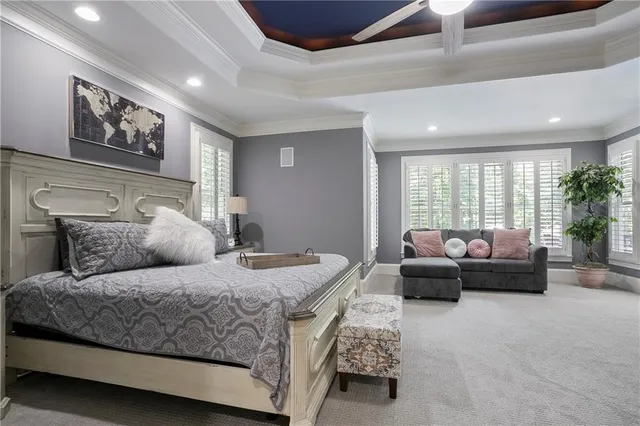 a en suite bathroom with a toilet sink and shower