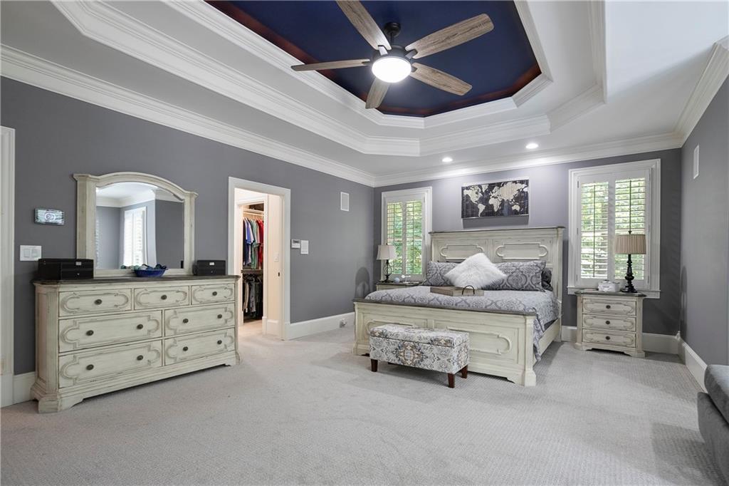 4185 Pool Road Winston, GA 30187 - Photo 23 of 51 a spacious bedroom with a bed and a dresser