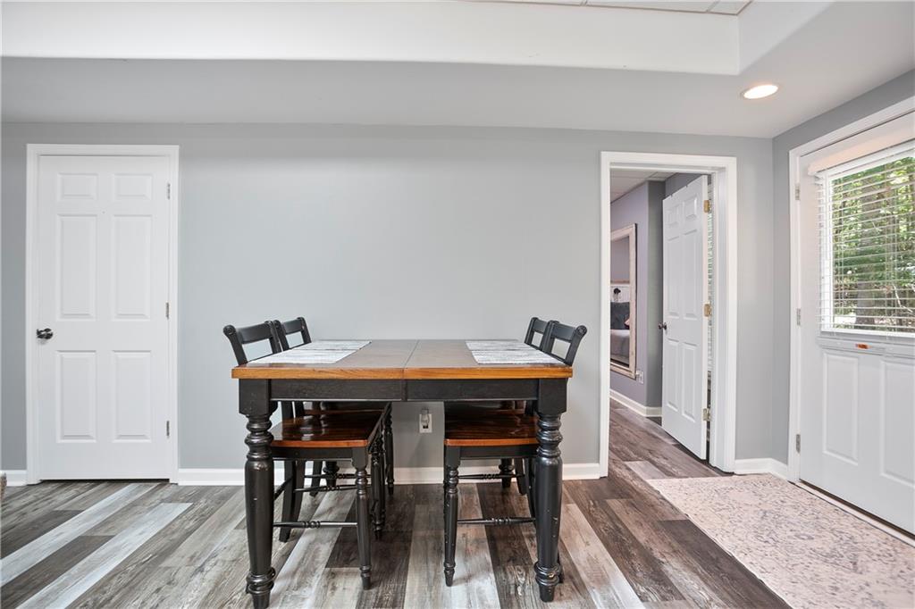 4185 Pool Road Winston, GA 30187 - Photo 40 of 51 a view of a dining room with furniture and wooden floor