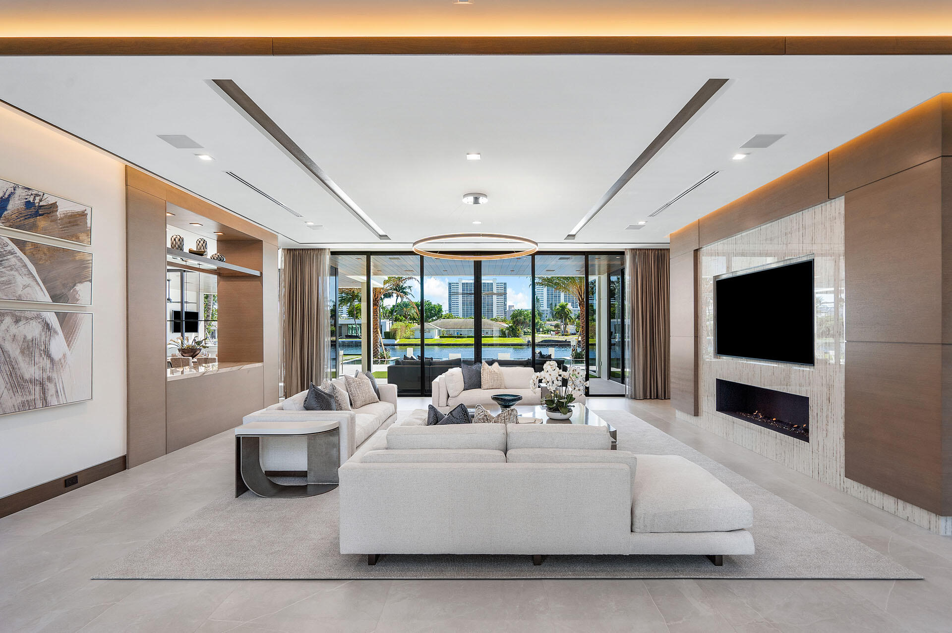 500 East Alexander Palm Road Boca Raton, FL 33432 - Photo 18 of 89 a living room with furniture and a flat screen tv