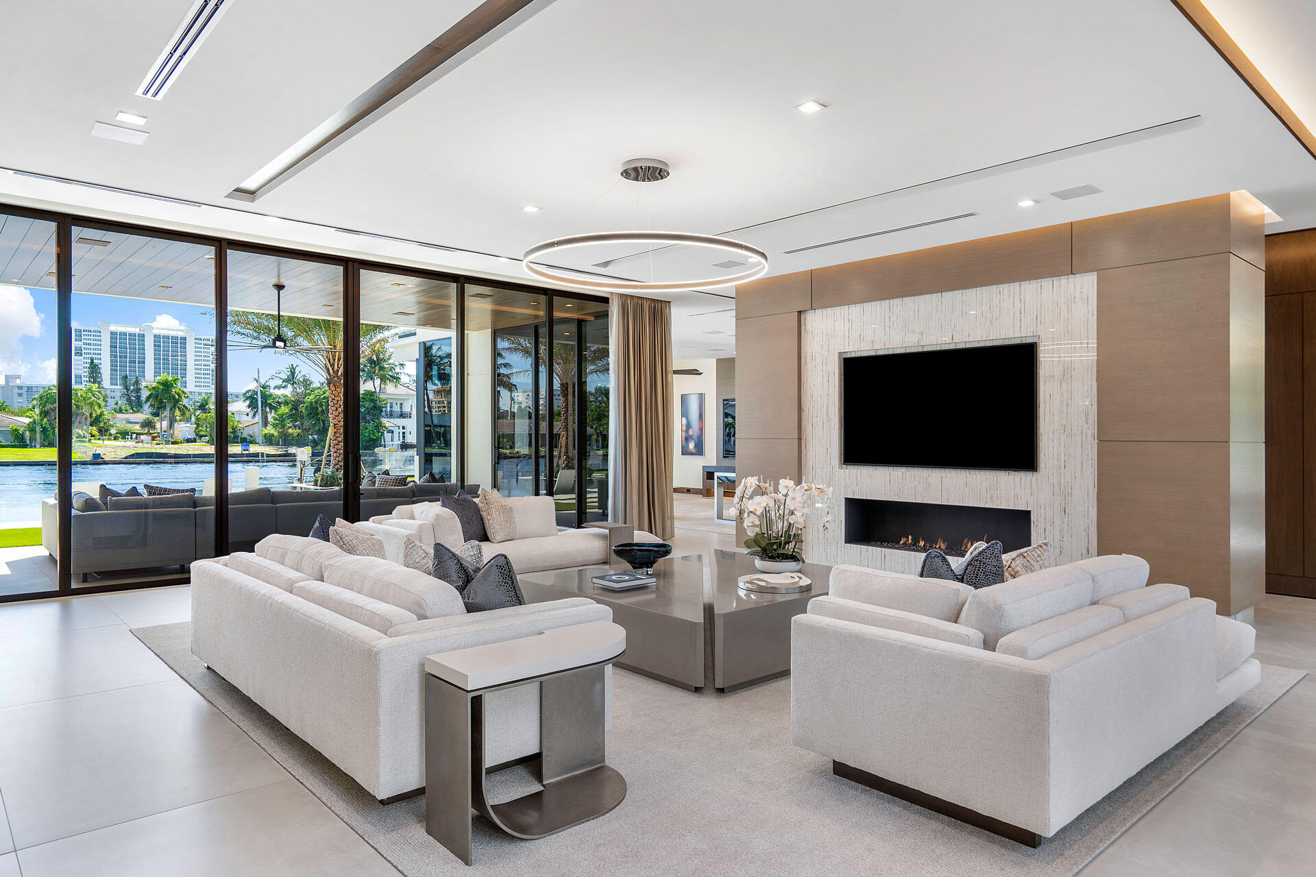 500 East Alexander Palm Road Boca Raton, FL 33432 - Photo 20 of 89 a living room with furniture and a flat screen tv