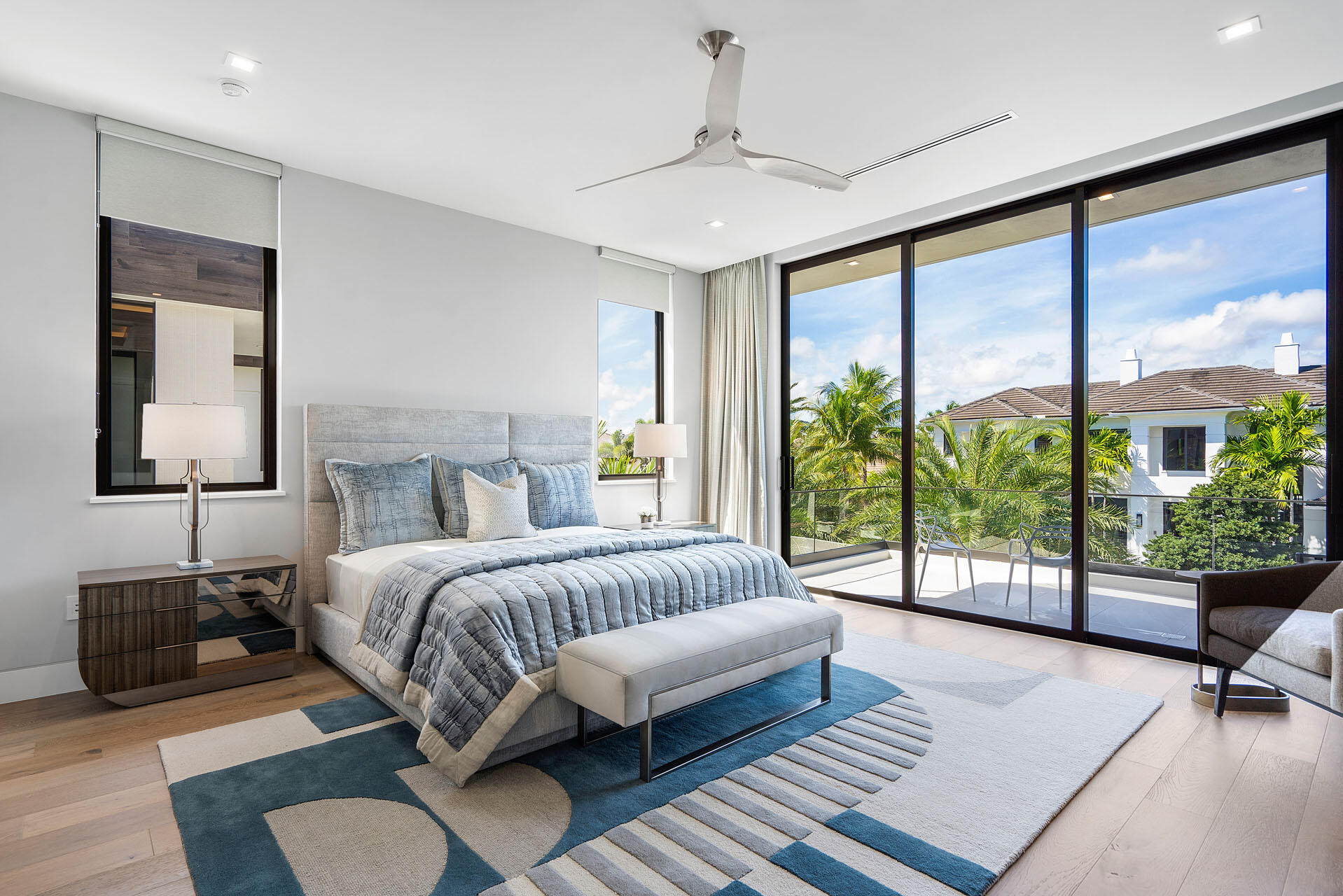 500 East Alexander Palm Road Boca Raton, FL 33432 - Photo 69 of 89 a spacious bedroom with a bed and glass window