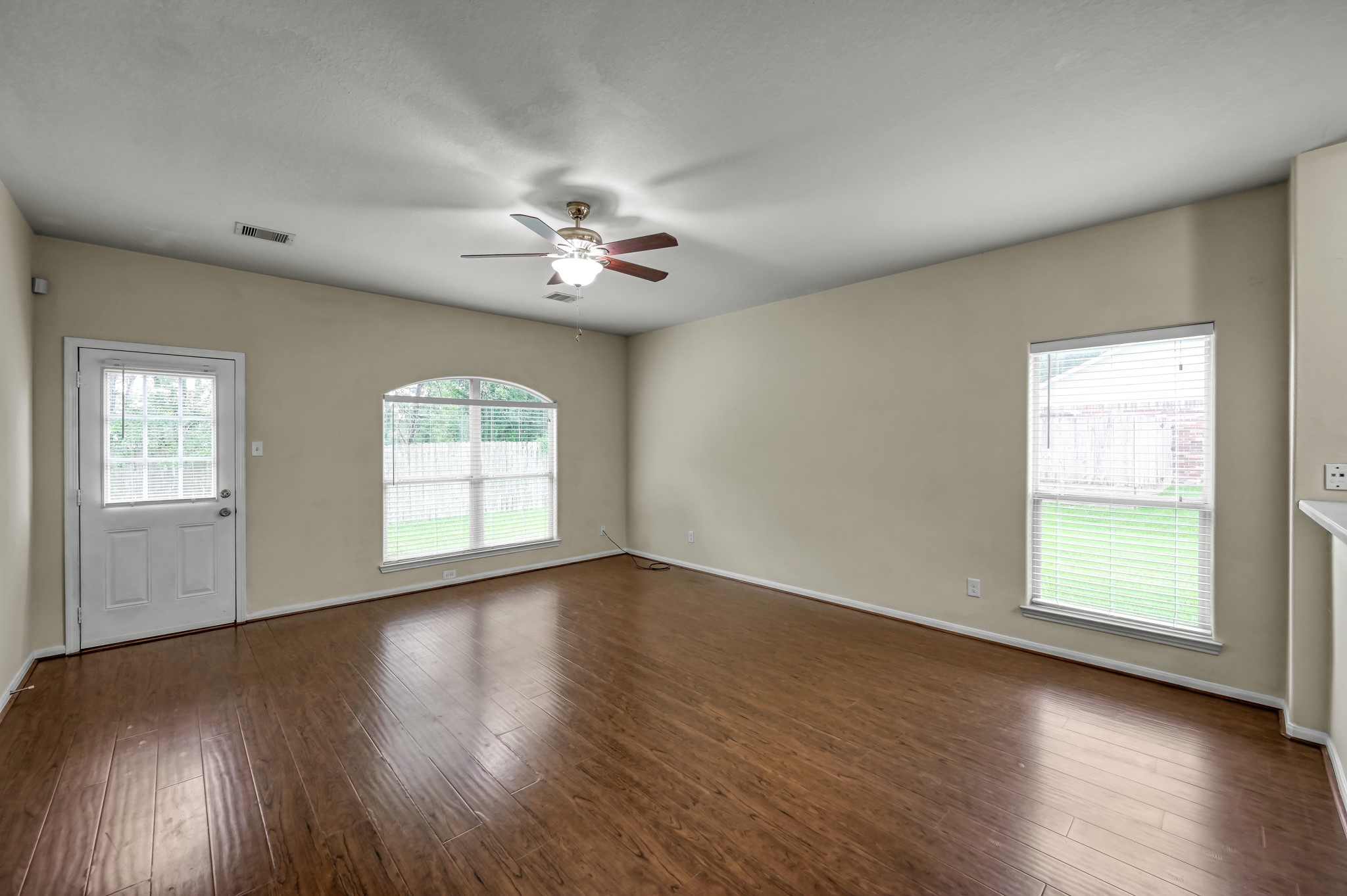 631 Timberstand Lane Spring, TX 77373 - Photo 9 of 38 The spacious family room offers an inviting place to gather with large windows, great natural light, and plenty of room to relax.