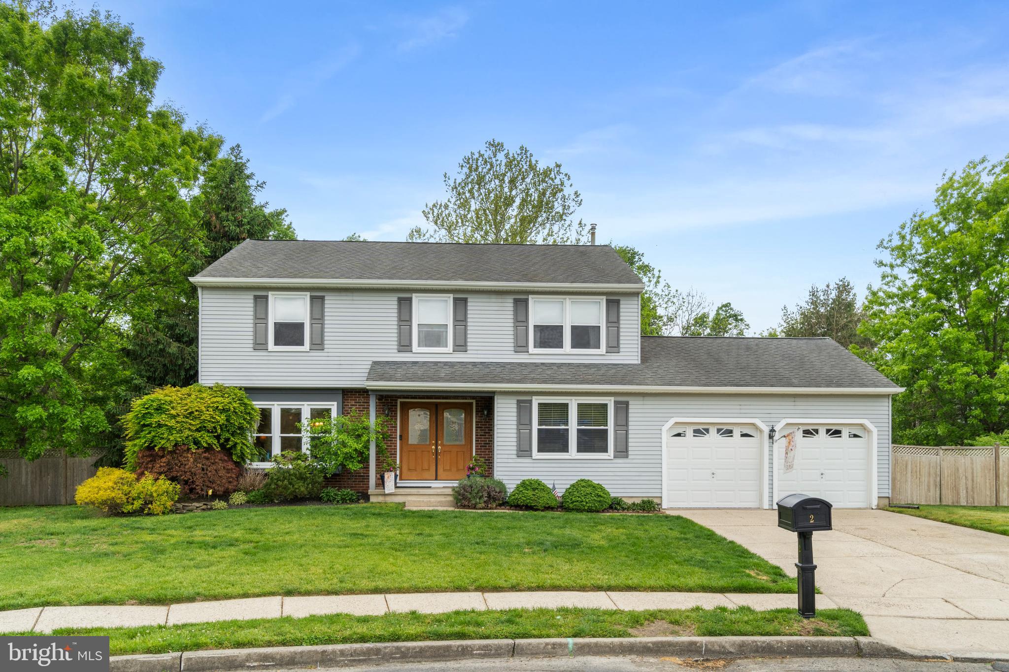 2 Farnham Court Laurel Springs, NJ 08021 - Photo 33 of 33 a front view of a house with a garden