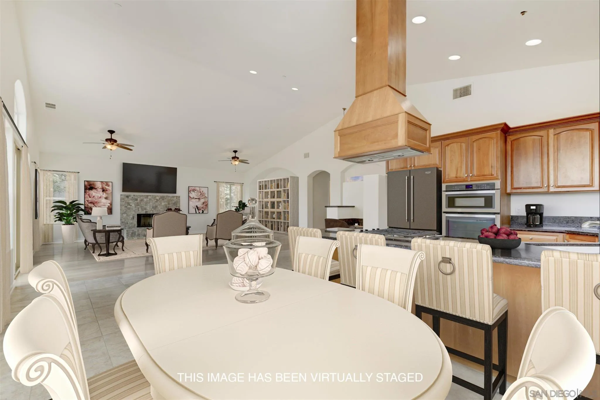 3650 Emma Road Vista, CA 92084 - Photo 11 of 25 a large kitchen with a table and chairs