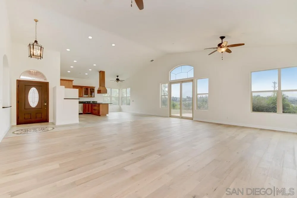 3650 Emma Road Vista, CA 92084 - Photo 4 of 25 wooden floor in an empty room with a window