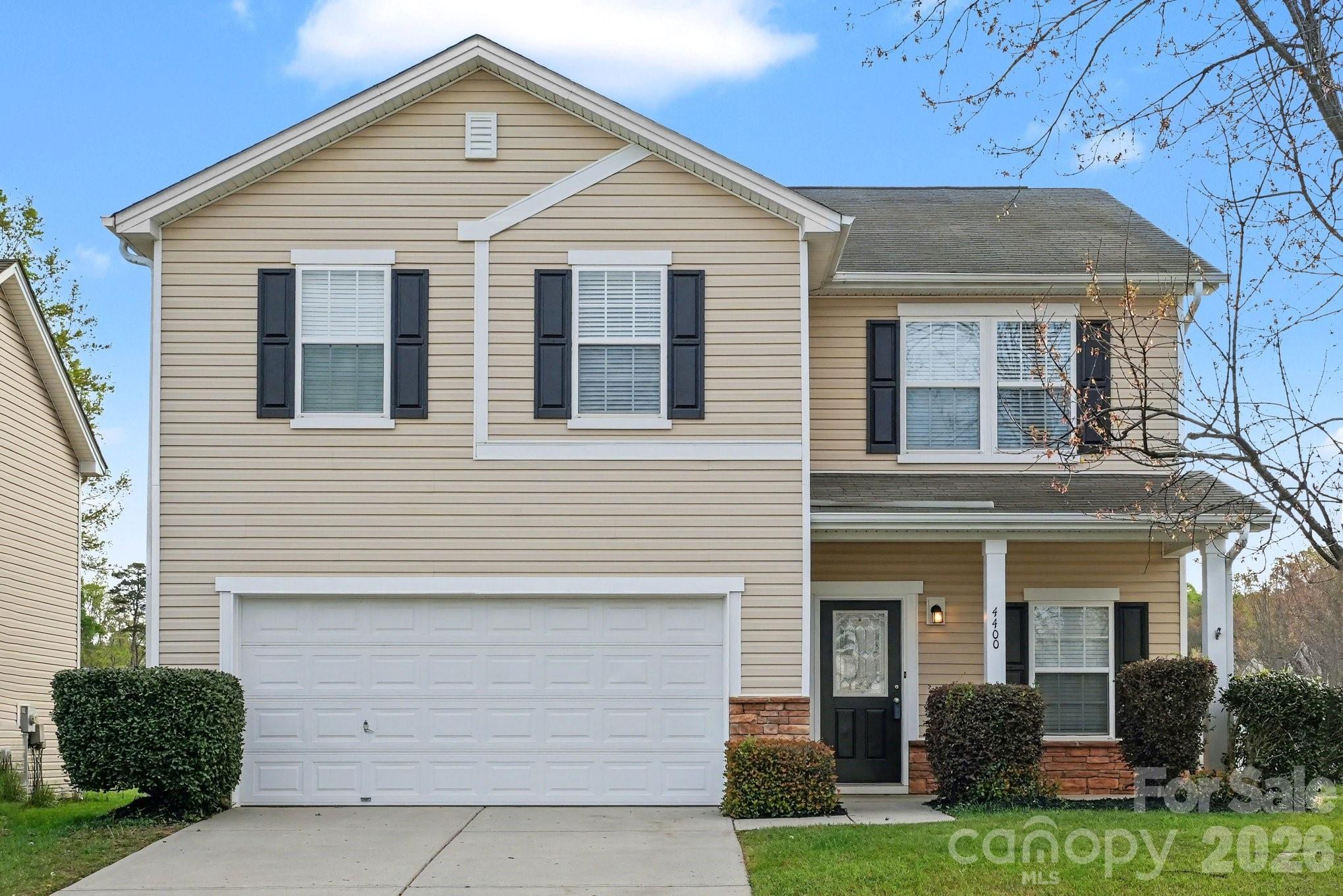 4400 Kiddle Lane Monroe, NC 28110 - Photo 1 of 28 a front view of a house with garden