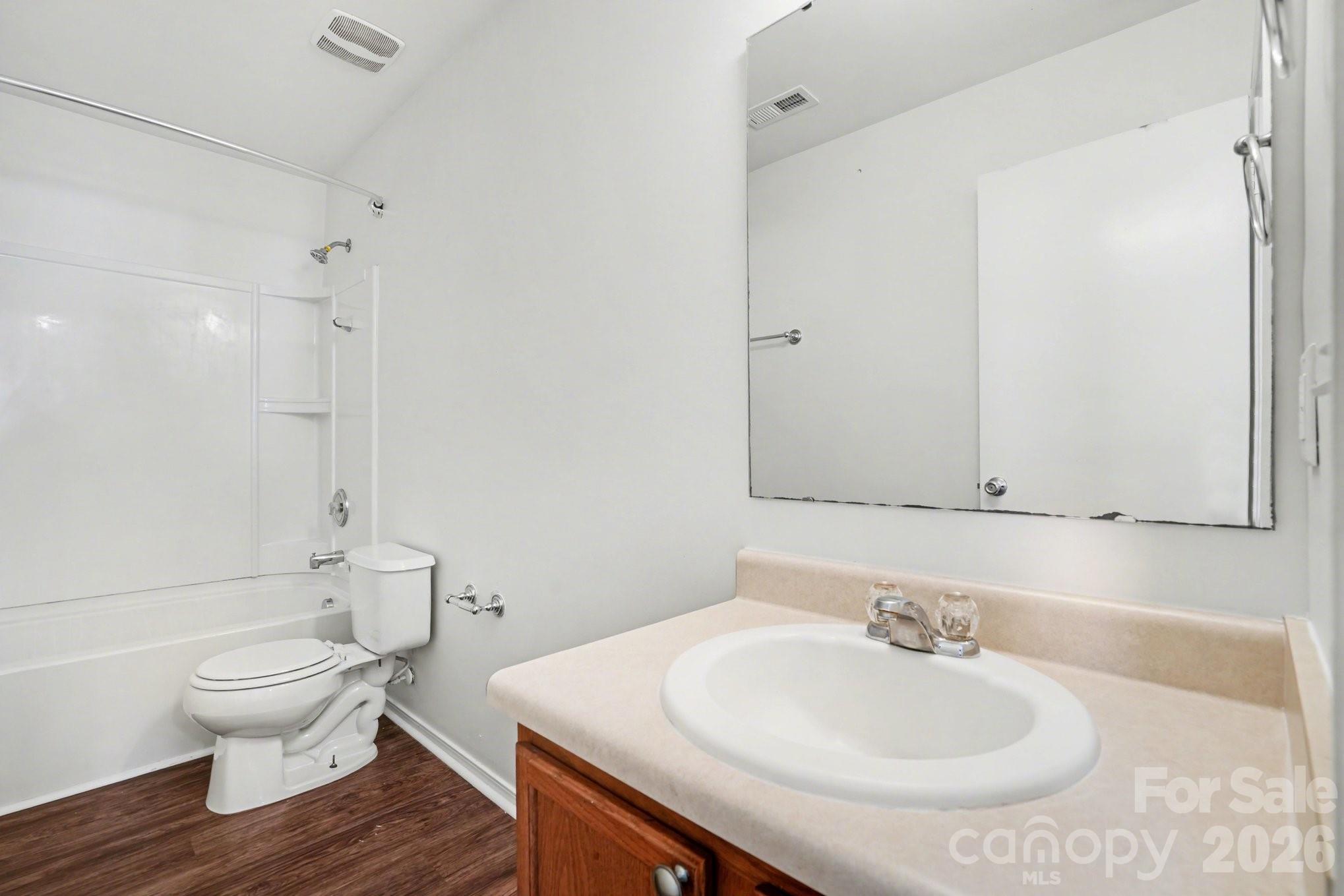 4400 Kiddle Lane Monroe, NC 28110 - Photo 18 of 28 a bathroom with a sink toilet and a mirror