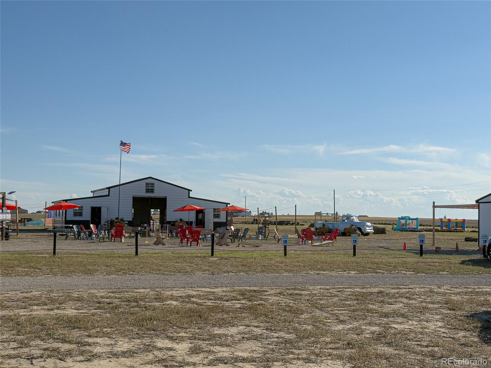9 Timberlake Road Byers, CO 80103 - Photo 28 of 28 a group of people sitting in a yard