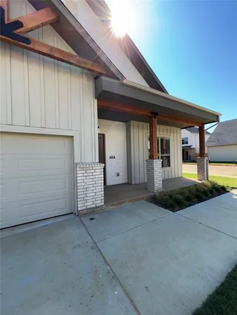 a view of a house with a garage