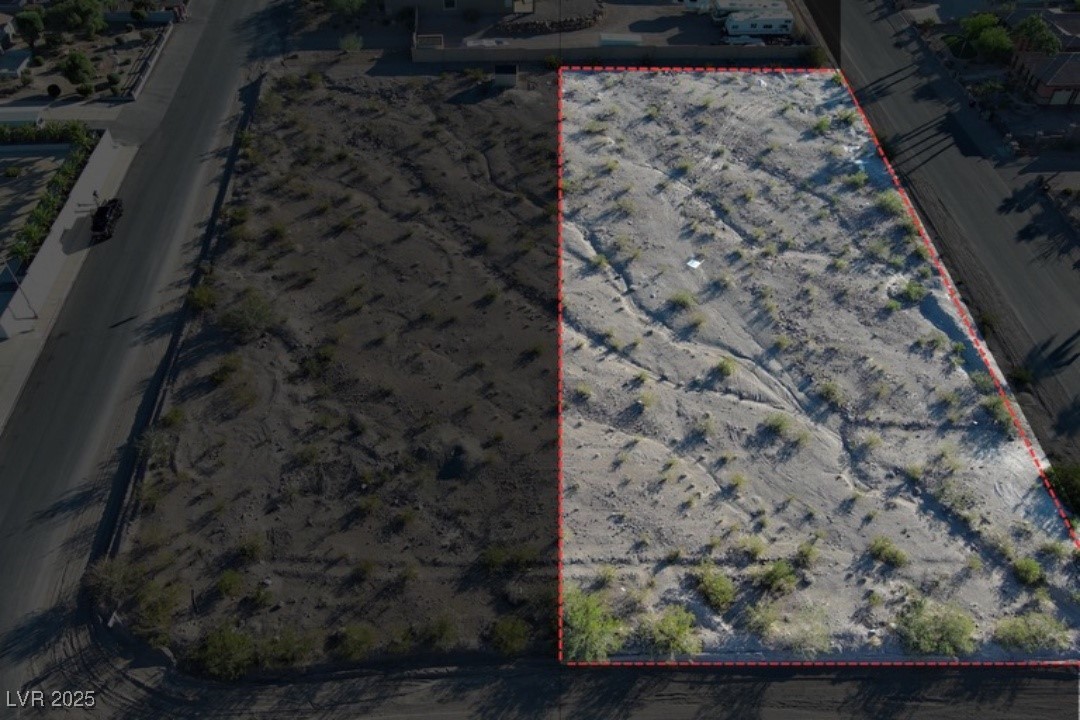 Aerial overview of property's location featuring property parcel outlined