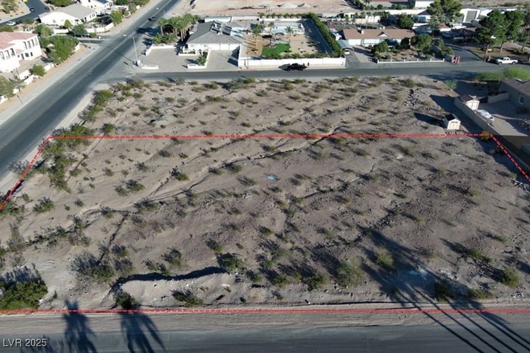 Aerial overview of property's location featuring property boundaries highlighted