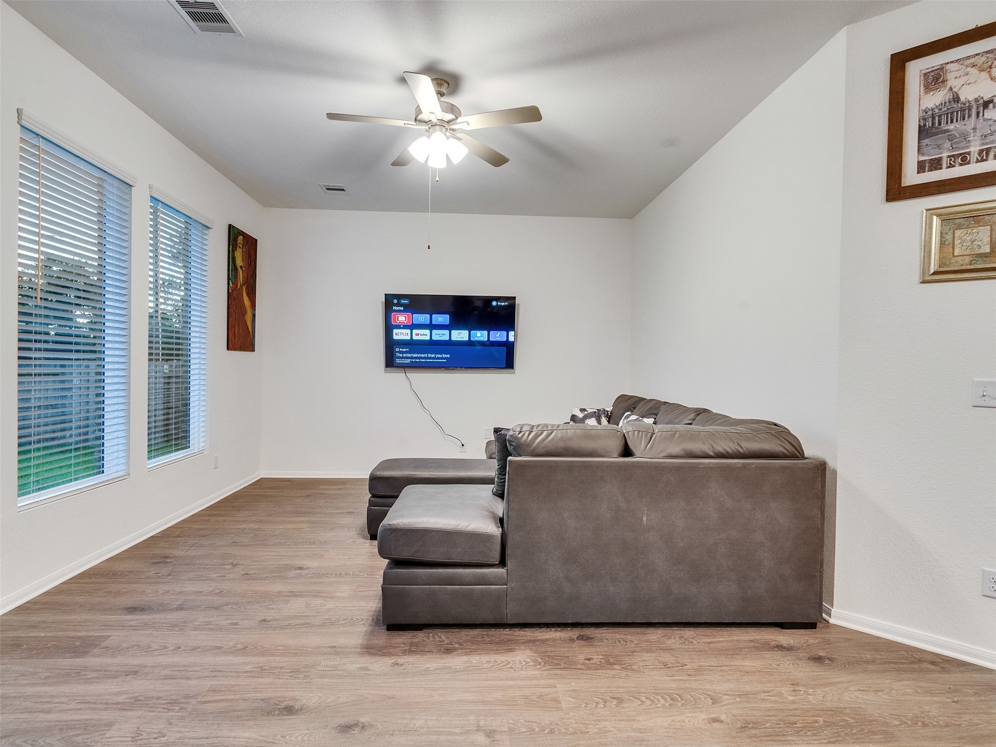 410 Magnolia Lane Richwood, TX 77531 - Photo 12 of 27 a living room with furniture and a chandelier
