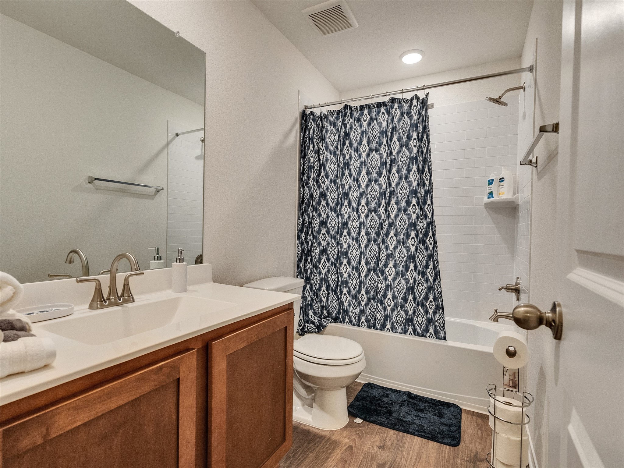 410 Magnolia Lane Richwood, TX 77531 - Photo 19 of 27 a bathroom with a sink toilet and shower