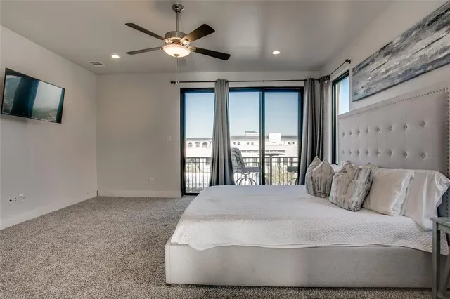 a kitchen with sink and view of living room