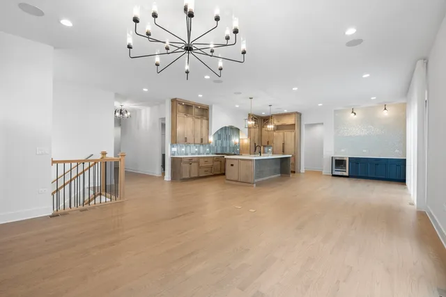 a view of a kitchen with a sink and a stove top oven