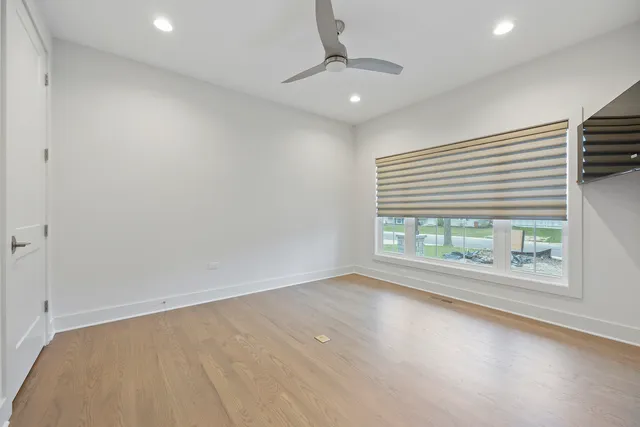 an empty room with windows and view