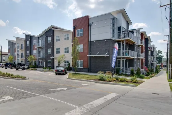 a view of a building with a street