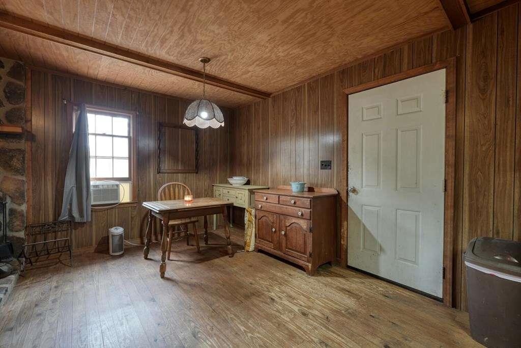 2479 Plum Orchard Road Clayton, GA 30525 - Photo 17 of 72 a view of a room with a table and chairs