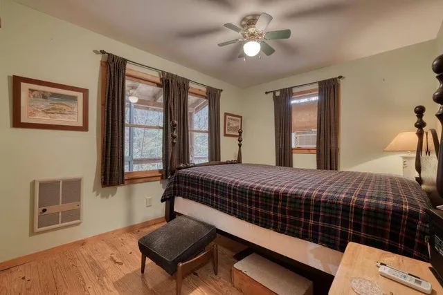 a view of backyard with a chair and table