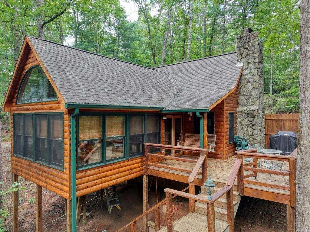 2479 Plum Orchard Road Clayton, GA 30525 - Photo 2 of 72 a view of backyard with deck and outdoor seating