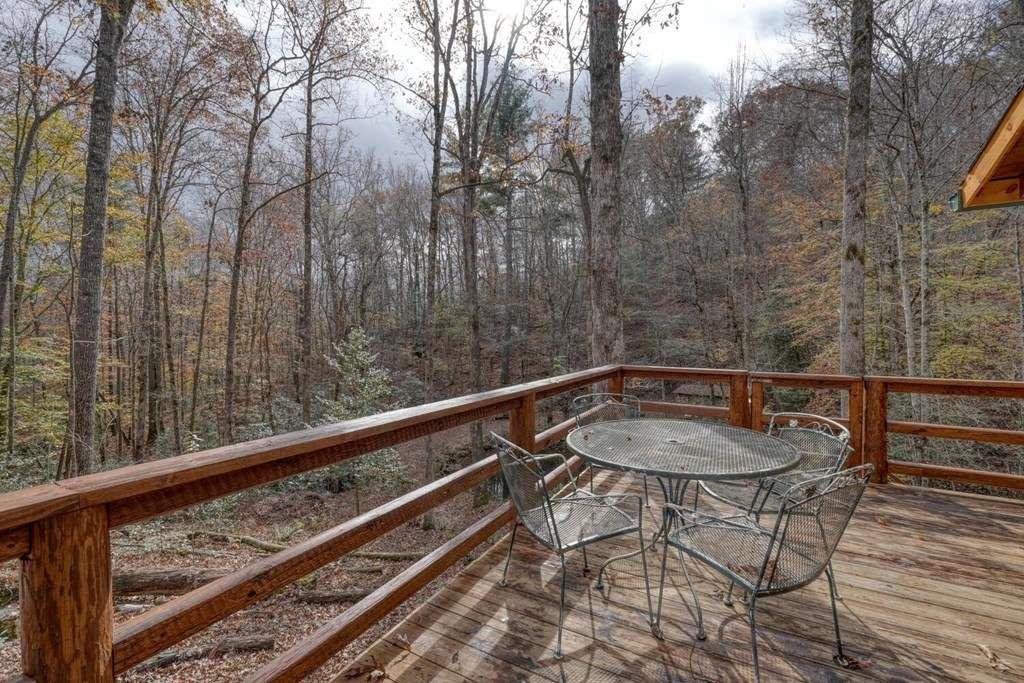 2479 Plum Orchard Road Clayton, GA 30525 - Photo 32 of 72 a view of balcony with wooden floor and outdoor seating