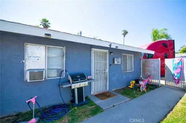 a front view of a house with yard