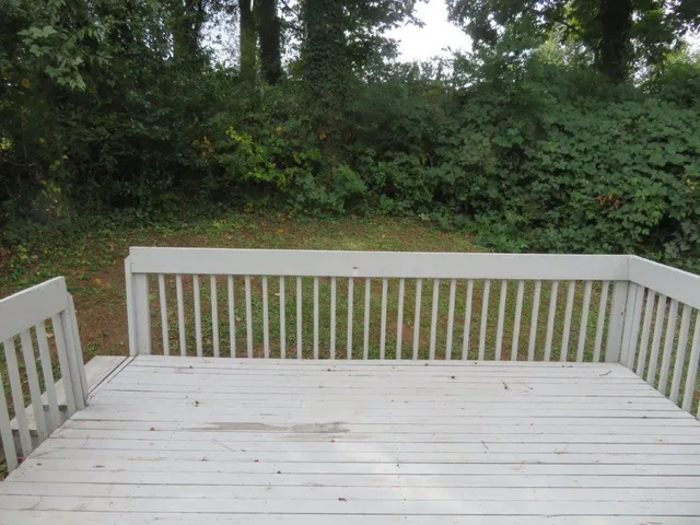 a view of a wooden roof deck
