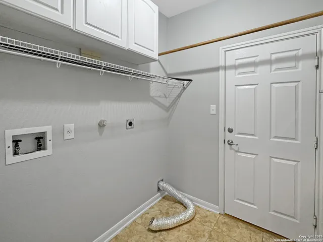 a bathroom with a sink double vanity and a mirror