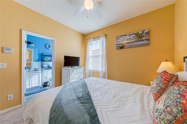 a spacious bathroom with a sink a toilet and shower