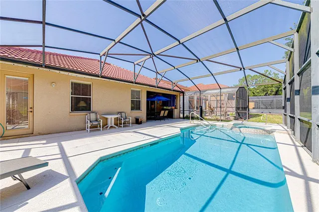 a garage with furniture and a chandelier