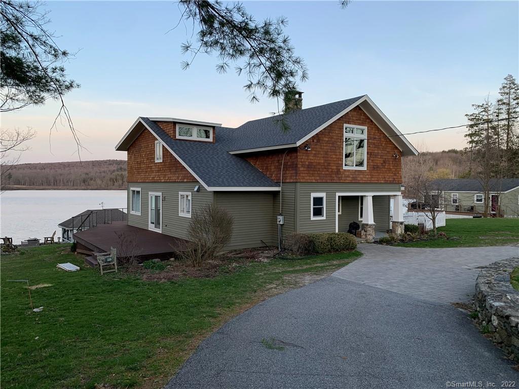 360 West Side Road Goshen, CT 06756 - Photo 1 of 1 a front view of a house with garden