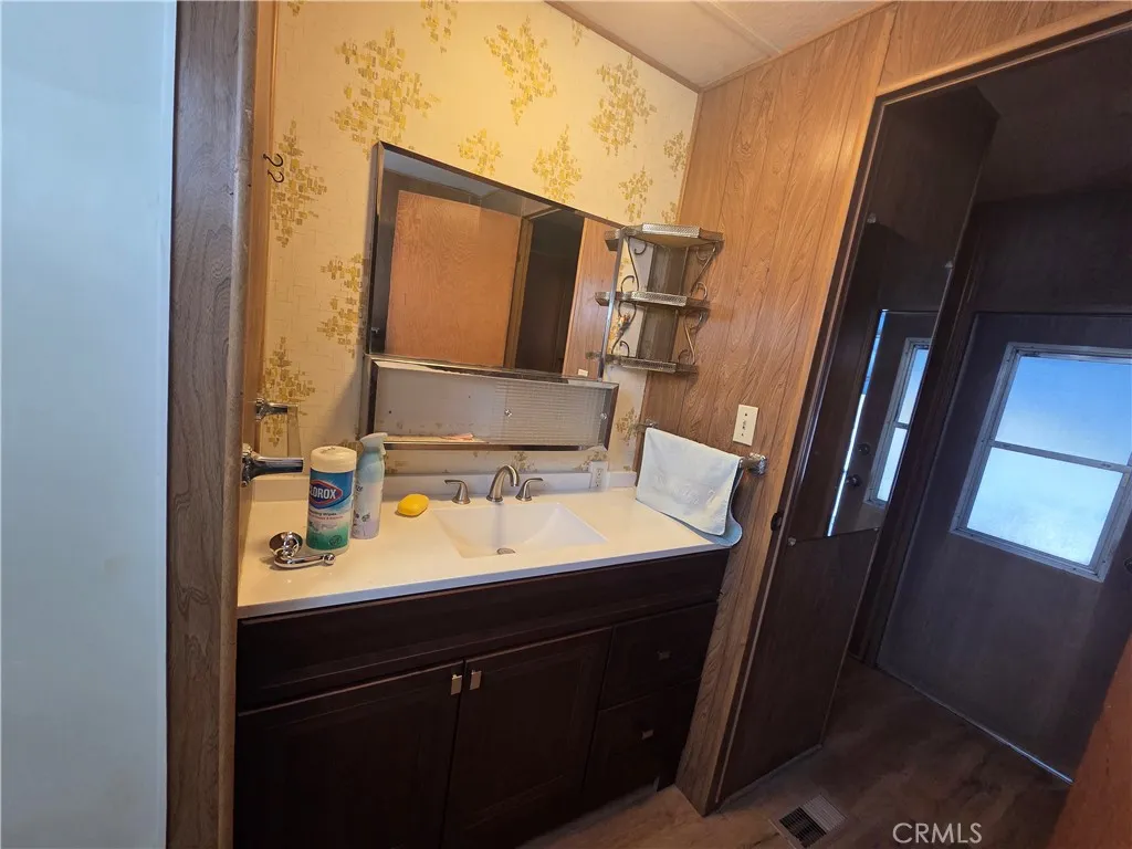 437 West Sp 3a Carson Street Long Beach, CA 90807 - Photo 14 of 29 a bathroom with a sink and a mirror