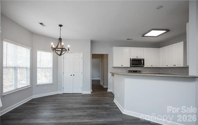 815 Knightsbridge Road Fort Mill, SC 29708 - Photo 11 of 30 a kitchen with stainless steel appliances a sink stove and refrigerator