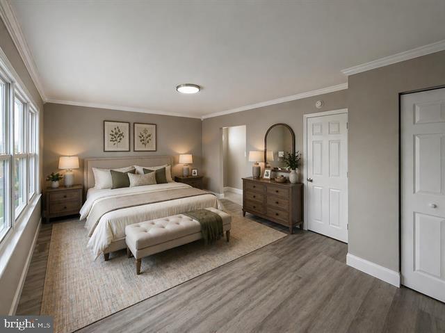 1964 East Oak Road, Unit G2 Vineland, NJ 08361 - Photo 17 of 28 a bedroom with a large bed and a view of bedroom