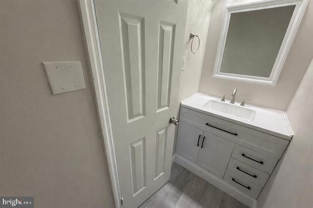 1964 East Oak Road, Unit G2 Vineland, NJ 08361 - Photo 9 of 28 a bathroom with a sink a mirror and a shower