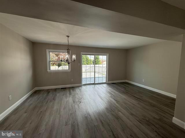 1964 East Oak Road, Unit G2 Vineland, NJ 08361 - Photo 10 of 28 an empty room with wooden floor and windows