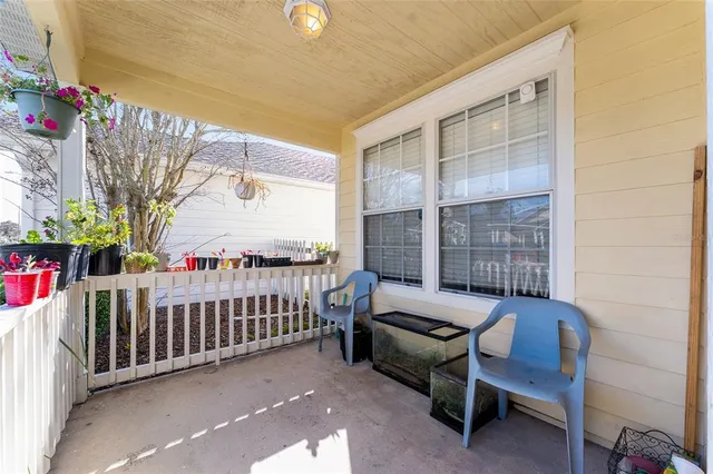 a view of a balcony with chairs