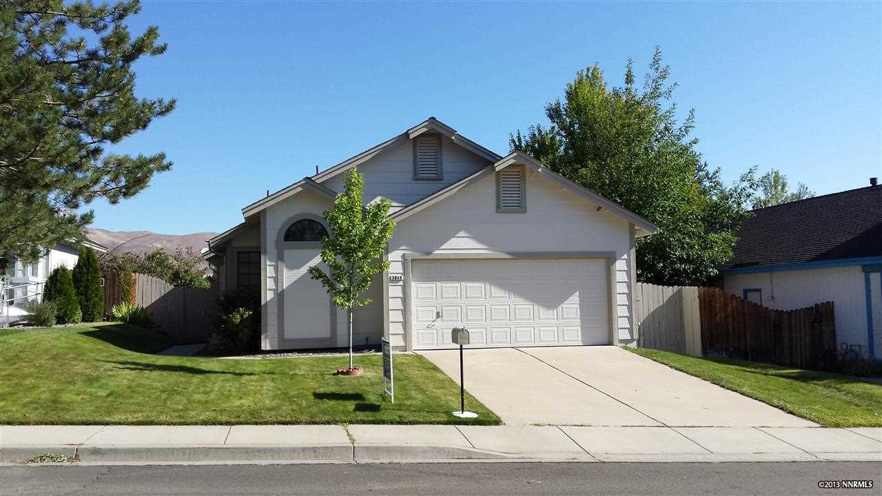 5949 Walnut Creek Road Reno, NV 89523 - Photo 1 of 1 a front view of a house with a yard and garage